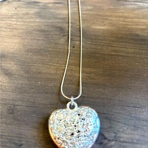 Gold Heart Pendant Necklace with Intricate Design